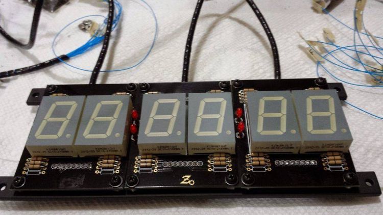 Quick Basic source code that displays a clock while waiting for input.