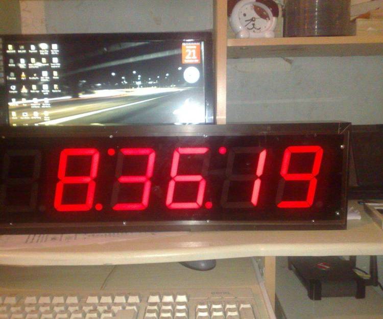 Displays a large digital clock, includes full C source.