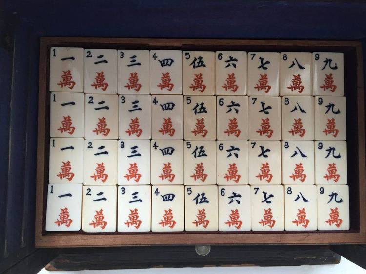 Mahjongg tile set of cigarette packs. Very good detail on some.