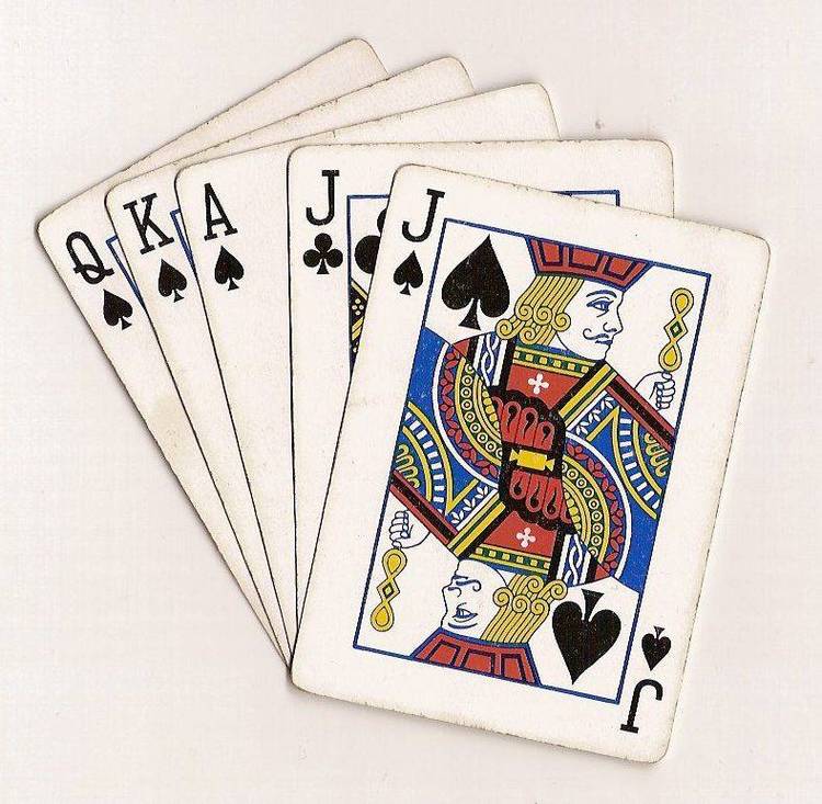 The game of Euchre, includes BASIC source code.
